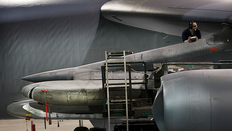 Airman loads AGM-86B air-cruise launch trainer missile onto B-52H Stratofortress, February 26, 2014, at Minot Air Force Base, North Dakota (U.S. Air Force/Aaron D. Allmon II)