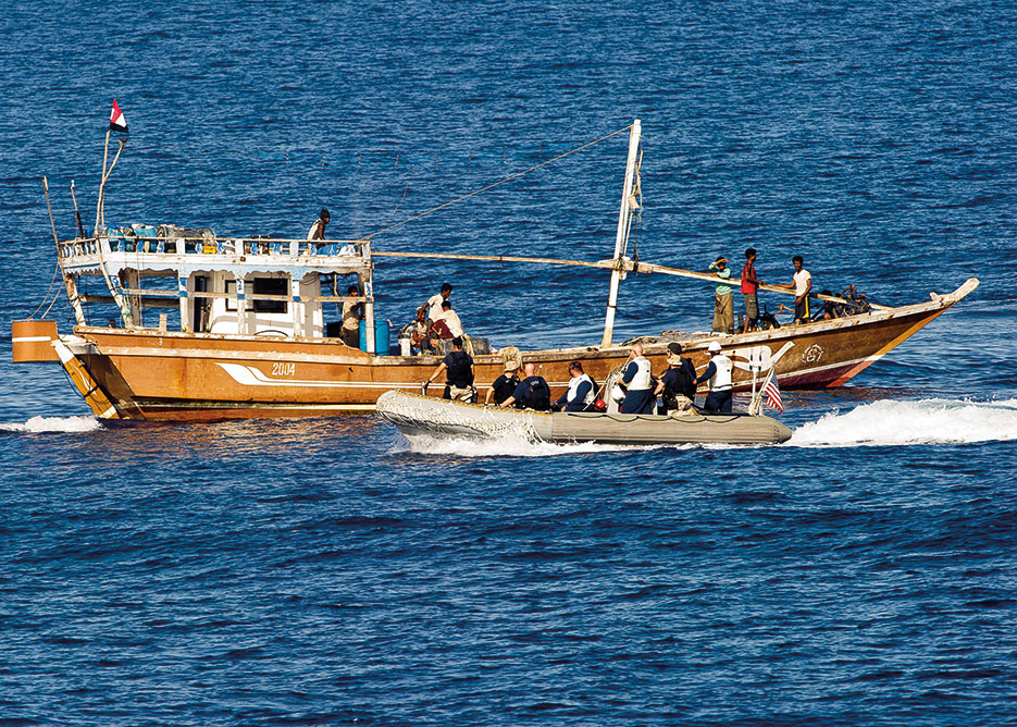 Members of visit, board, search, and seizure team of guided missile frigate USS Taylor, assigned to Commander, NATO Task Force 508, supporting Operation Ocean Shield, respond to disabled Yemeni fishing dhow Nahda in Gulf of Aden, May 20, 2012 (U.S. Navy/Peter Santini)