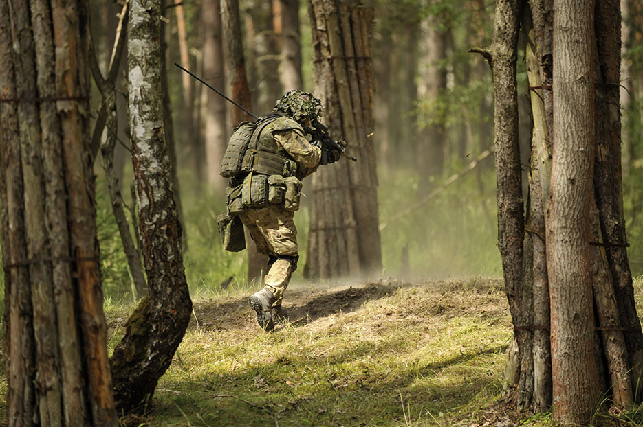 Danish soldier rushes objective during live-fire exercise at Joint Multinational Training Command’s Grafenwoehr Training Area in Germany, July 4, 2014 (DOD/Markus Rauchenberger)