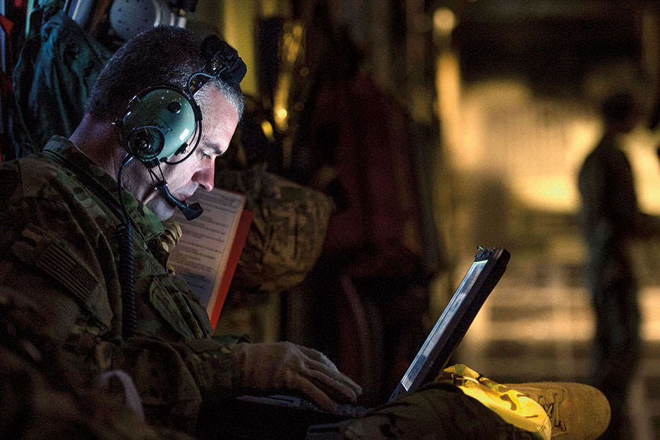 Airman assigned to 379th Expeditionary Aeromedical Evacuation Squadron logs patient’s information into Electronic Health Record system in Southwest Asia to support Operation Inherent Resolve, January 6, 2016 (U.S. Air Force/Nathan Lipscomb)