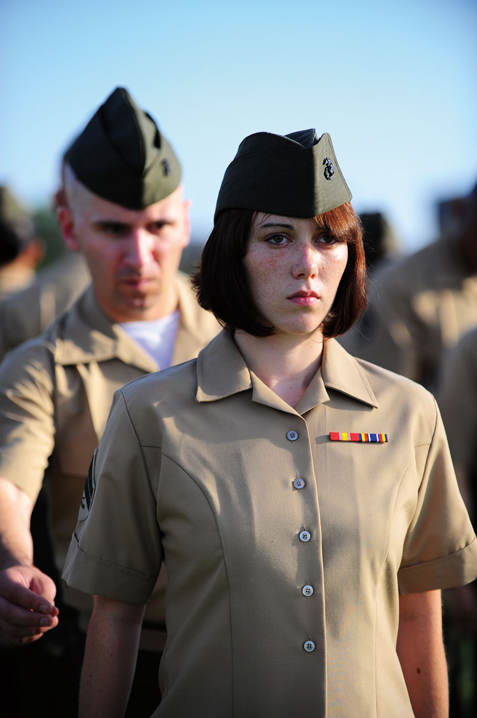Instructor inspects Marine’s uniform during 16-day Corporals Course, U.S. Marine Corps Enlisted Professional Military Education course, which was taught for first time at Dyess Air Force Base, Texas, August 5, 2010 (U.S. Air Force/Domonique Washington)