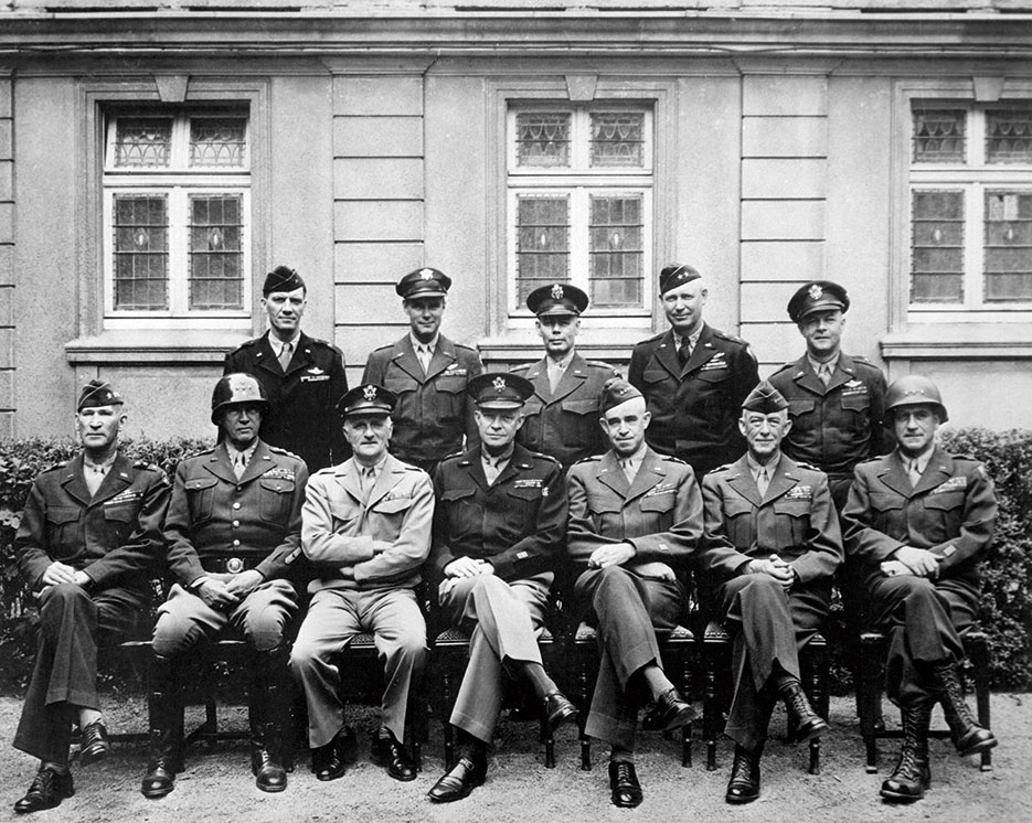 Senior American commanders in Western Europe, 1945; seated, left to right, William Hood Simpson, George S. Patton, Carl A. Spaatz, Dwight D. Eisenhower, Omar Bradley, Courtney Hodges, Leonard T. Gerow; standing, left to right, Ralph Francis Stearley, Hoyt Vandenberg, Walter Bedell Smith, Otto P. Weyland, and Richard E. Nugent (U.S. Army/National Archives and Records Administration)