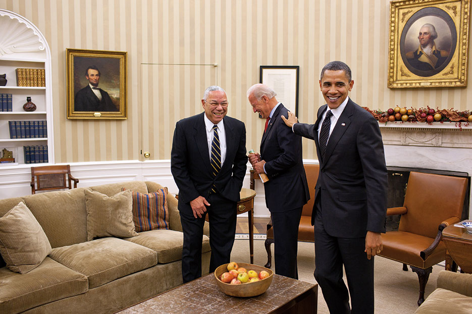 President Obama jokes with Vice President Biden and former Secretary of State Colin Powell following meeting in Oval Office, December 2010 (The White House/Pete Souza)