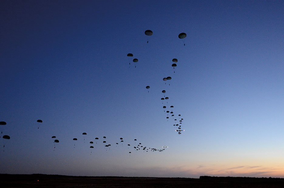 Soldiers conduct static line airdrop during Joint Operational Access Exercise 13-02, at Sicily drop zone, Fort Bragg, North Carolina, to train with paratroopers from U.S. Army’s 82nd Airborne Division on projecting combat power in denied environments (DOD/Jason Robertson)
