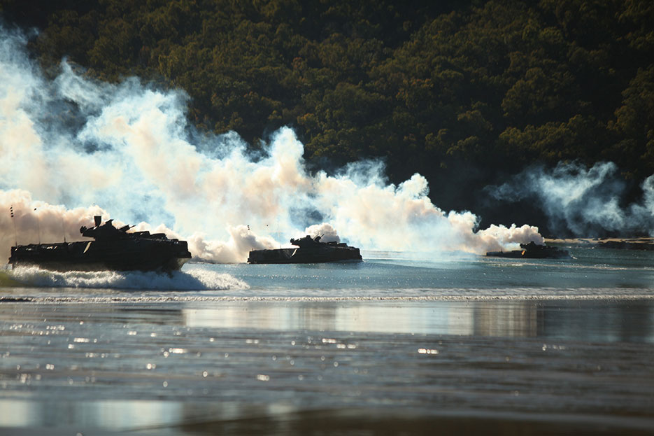 Amphibious assault vehicles carrying Company G, Battalion Landing Team 2nd Battalion, 7th Marines, 31st Marine Expeditionary Unit, charge onto Freshwater Beach during Exercise Talisman Sabre 2011, Queensland, Australia (U.S. Marines/Garry J. Welch)