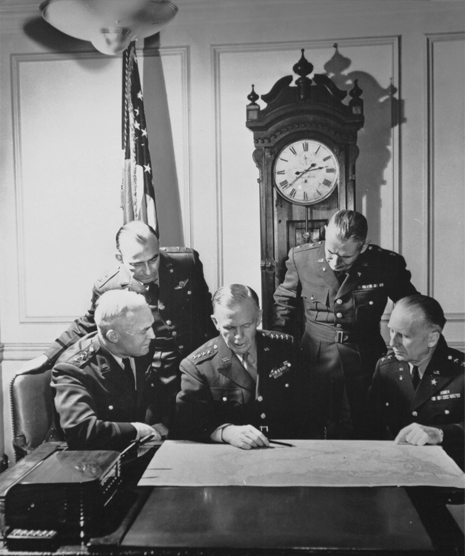 Left to right, Henry H. Arnold, Joseph T. McNarney, George C. Marshall, Brehon B. Somervell, and Lesley J. McNair (NDU Special Collections)