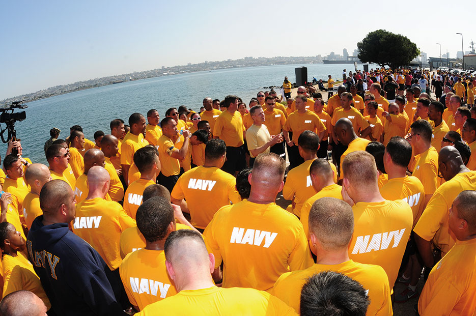 Commanding officer of USS Ronald Reagan talks to Reagan Sailors at Stomp Out Sexual Assault 5k run on Naval Air Station North Island, April 2013 (U.S. Navy/Omar Powell)