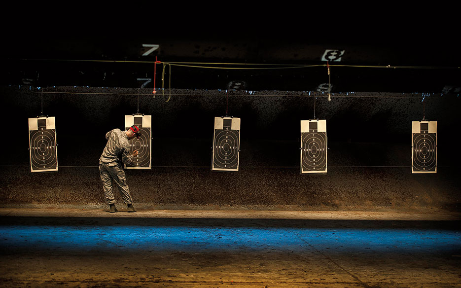 Servicemembers, civilians, dependents, and retirees from Joint Base Charleston, South Carolina, and local community competed during Security Forces Shooting Competition, May 15, 2013, in honor of National Police Week (U.S. Air Force/Dennis Sloan)