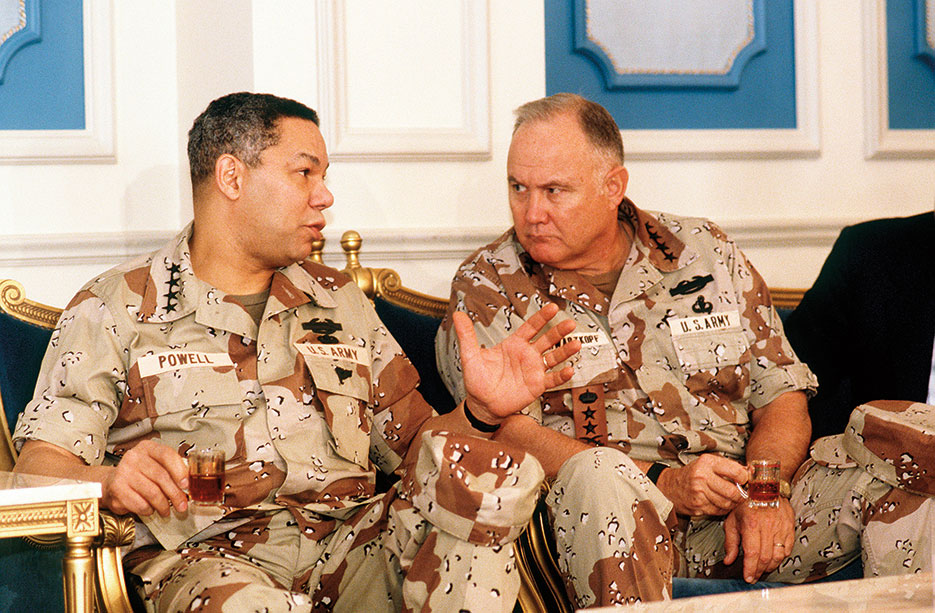 General Norman H. Schwarzkopf, Commander, U.S. Central Command, consults with Chairman of the Joint Chiefs of Staff General Colin Powell regarding allied military coalition during Operation Desert Shield, July 18, 1990 (DOD/H.H. Deffner)