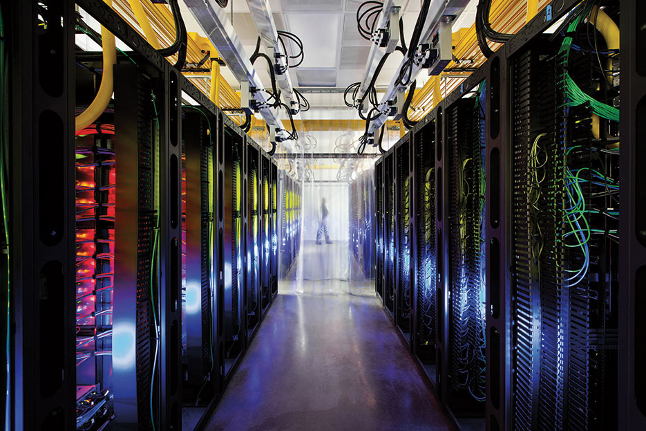 Routers and switches inside Google’s campus network room at Council Bluffs, Iowa, allow data centers to talk to one another, with fiber-optic networks that run at speeds more than 200,000 times faster than typical home Internet connections (Photo courtesy Google Inc.)