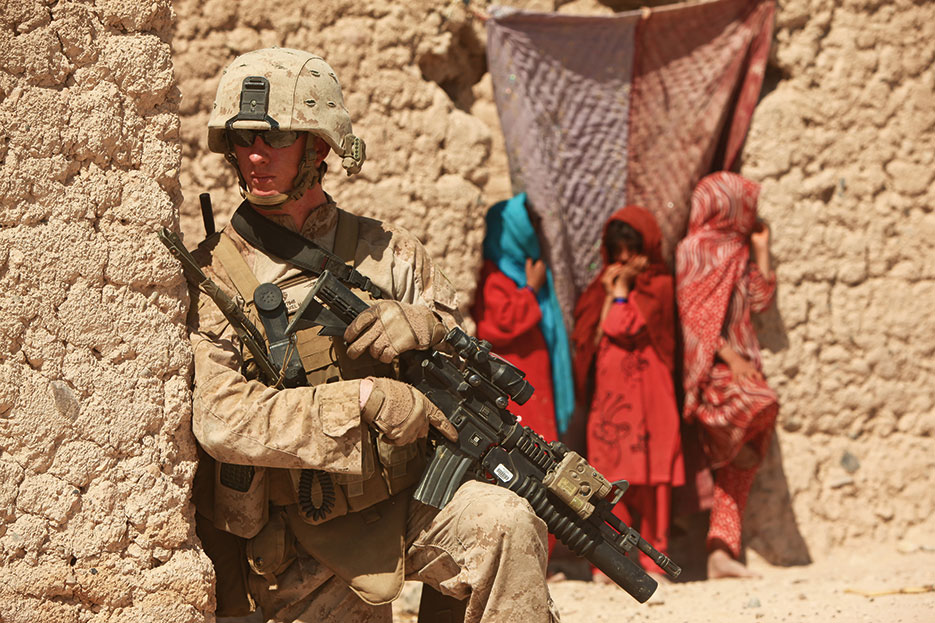 Marine with Mobile Assault Platoon 4, Weapons Company, 1st Battalion, 25th Marine Regiment patrols southern Washir District, Helmand Province, October 2, 2011