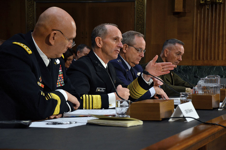 From left, former Service chiefs General Raymond T. Odierno, USA, Admiral Jonathan Greenert, USN, General Mark A. Welsh III, USAF, and General Joseph F. Dunford, Jr. (USMC), testified before Senate Armed Services Committee on effect of Budget Control Act of 2011 and sequestration on national security, January 28, 2015 (U.S. Navy/Julianne F. Metzger)