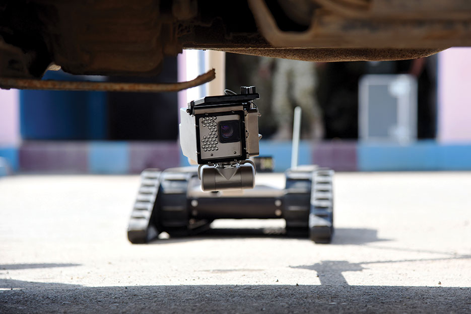iRobot 510 PackBot searches for explosive devices under vehicle in Djibouti (U.S. Air Force/Maria Bowman)
