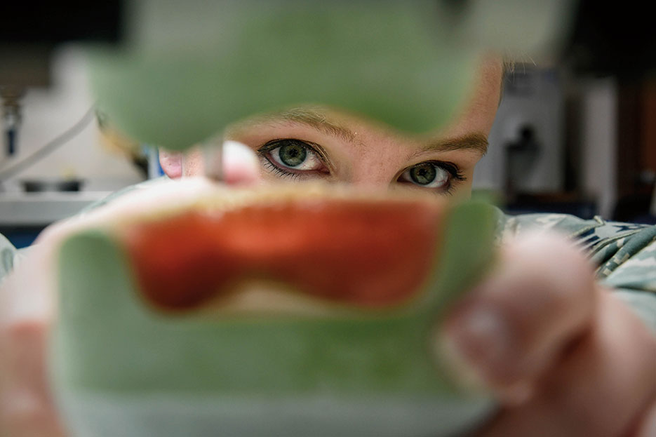 Senior Airman provides dental care as member of 59th Dental Support Squadron, providing high-performance health system dedicated to excellence in global dental care and education, Base San Antonio–Lackland, Texas, January 26, 2016 (U.S. Air Force/Keith James)