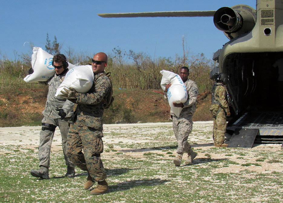 Members of U.S. Southern Command–directed team Joint Task Force–Matthew provide humanitarian and disaster relief assistance to victims of Hurricane Matthew, Jeremie, Haiti, October 8, 2016 (U.S. Marine Corps, South/Adwin Esters)
