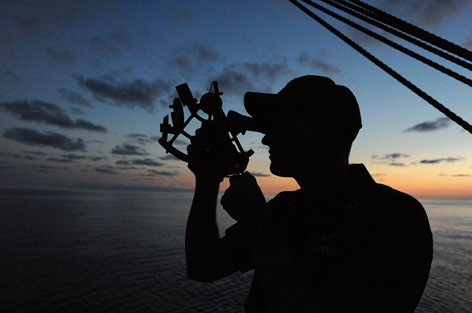 U.S. Coast Guard Academy officer candidate practices navigating using stars and sextant during evening training session aboard U.S. Coast Guard Barque Eagle, September 13, 2012 (U.S. Coast Guard/Lauren Jorgensen)