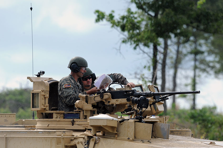 North Carolina Army National Guardsmen from C Company, 1st Battalion, 252nd Armored Regiment, prepare for next event in General Gordon Sullivan Cup Best Tank Crew Competition, May 2, 2016, at Fort Benning, Georgia (U.S. Army/Jon Soucy)