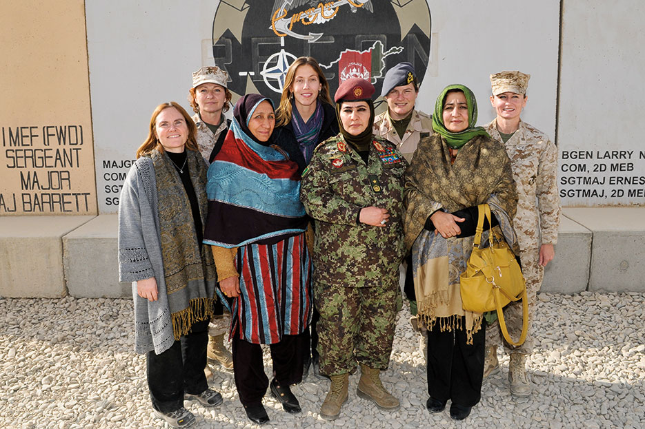 Afghan National Army Brigadier General Khatol Mohammadzai stands alongside other members of both military and civilian services at Regional Command Southwest (Courtesy Royal Air Force/Paul Oldfield)
