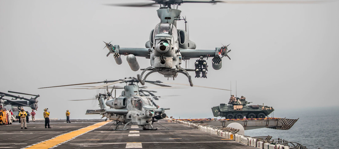AH-1Z Viper helicopter takes off during strait transit