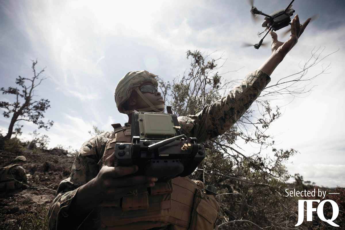 Marine Corps Lance Corporal Dmitri Shepherd launches drone