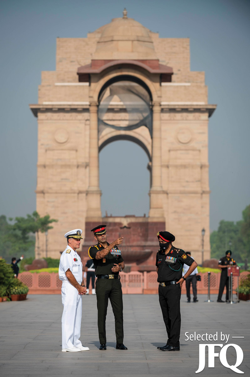 Admiral John C. Aquilino, Colonel Aakash Khazanchi, and Brigadier A.S. Randhawa speak before wreath laying ceremony at India’s National War Memorial