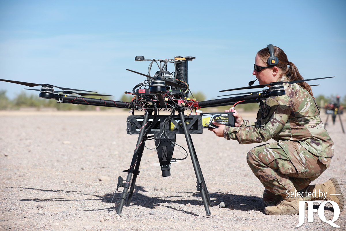 Army Staff Sergeant conducts maintenance on unmanned aerial system in preparation for Project Convergence 21