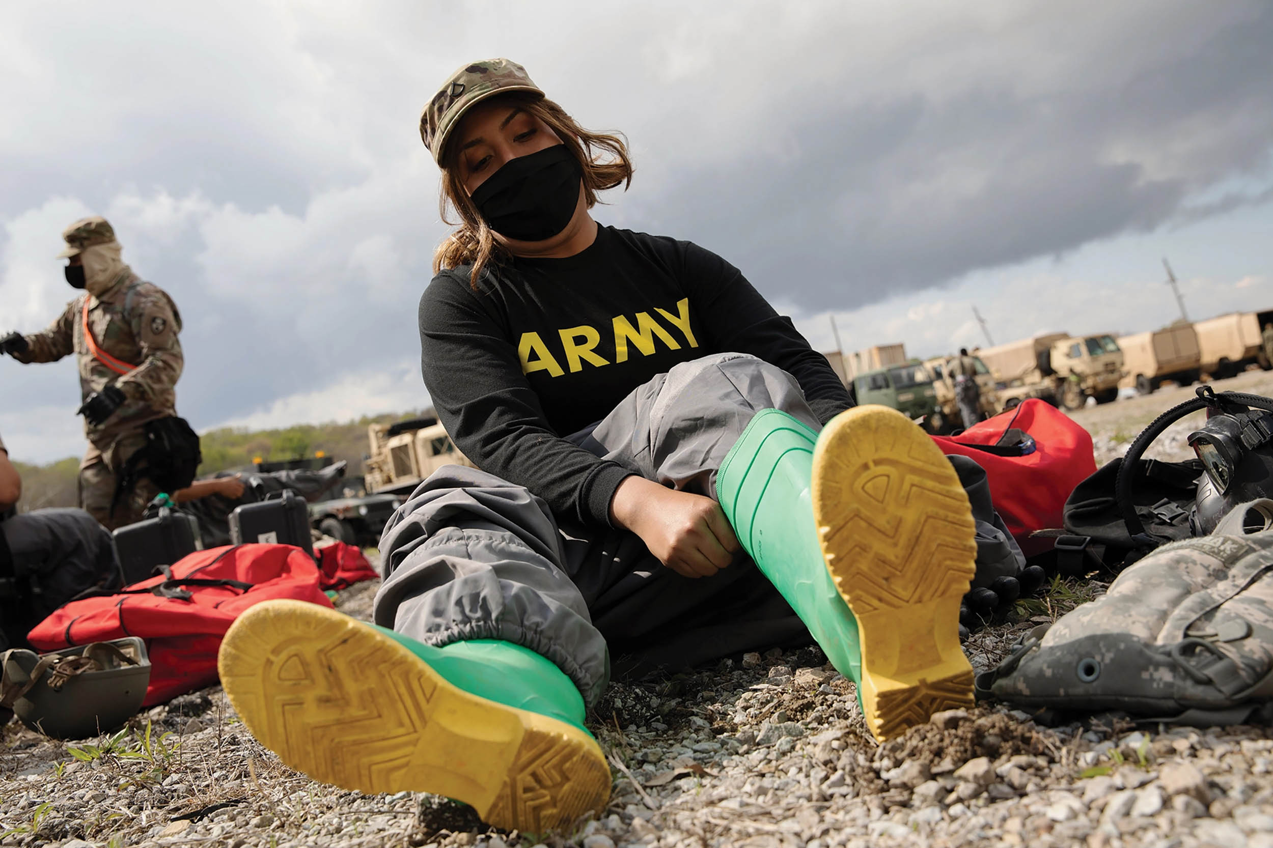 Chemical, biological, radiological, and nuclear specialist with 140th Chemical Company, California Army National Guard, dresses in MOPP 4 protective gear