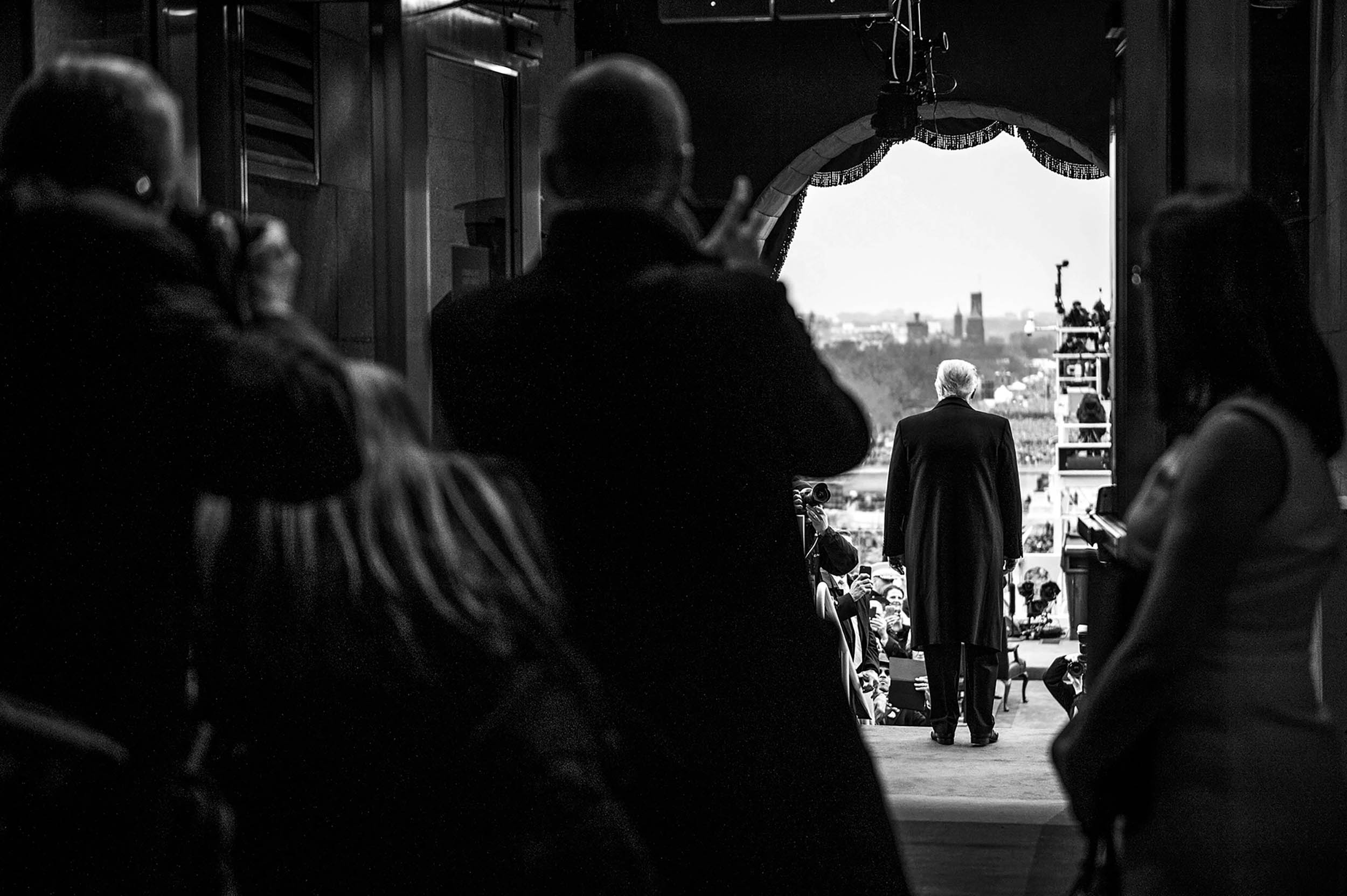 President-elect Donald J. Trump stands on platform of Capitol during 58th Presidential Inauguration in Washington, DC