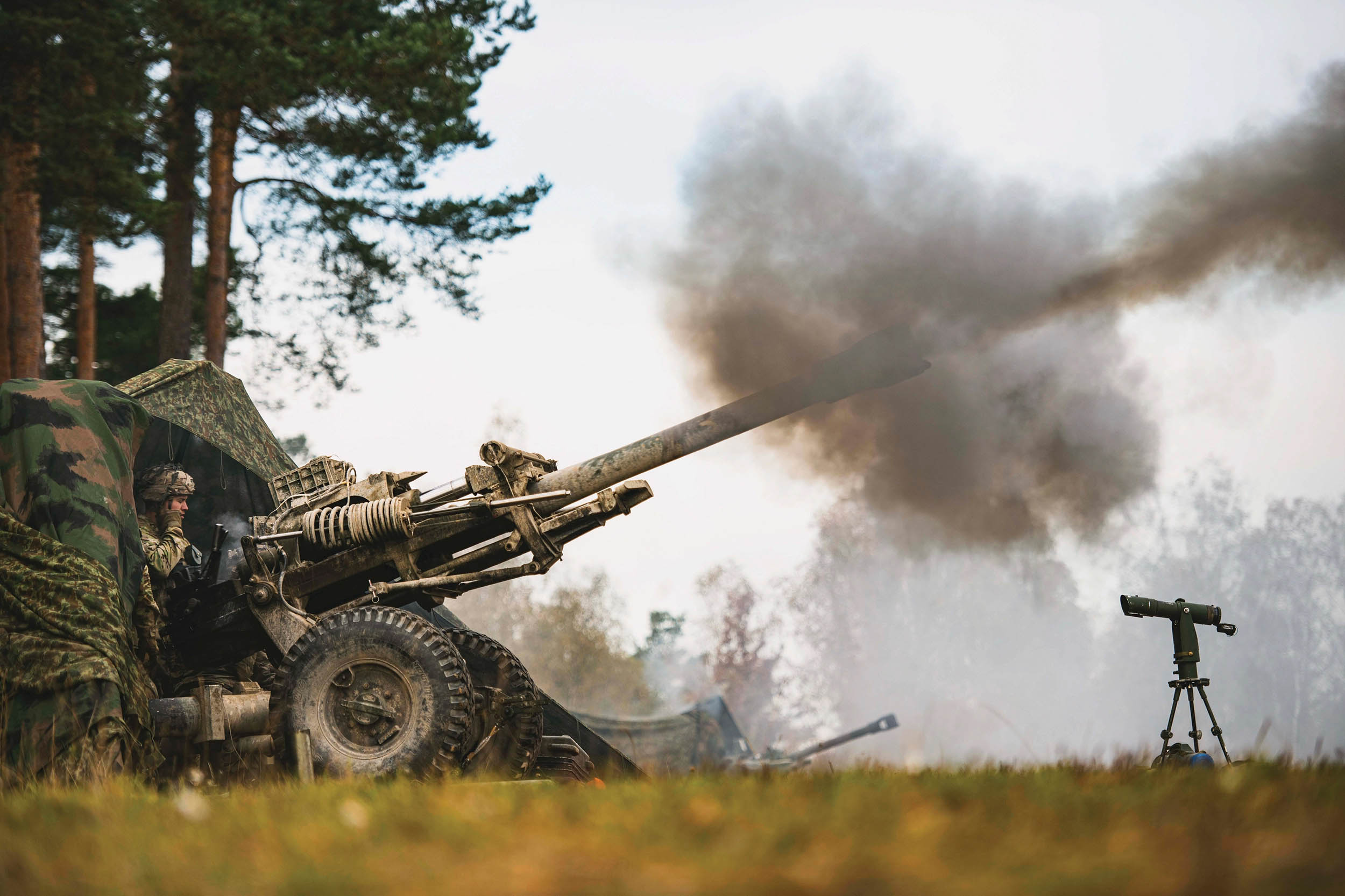 Army paratroopers assigned to 4th Battalion, 319th Airborne Field Artillery Regiment, fire M119A3 Howitzer during field artillery live fire exercise as part of exercise Bayonet Ready 22, at Joint Multinational Training Center, Grafenwoehr Training Area, Germany, October 25, 2021