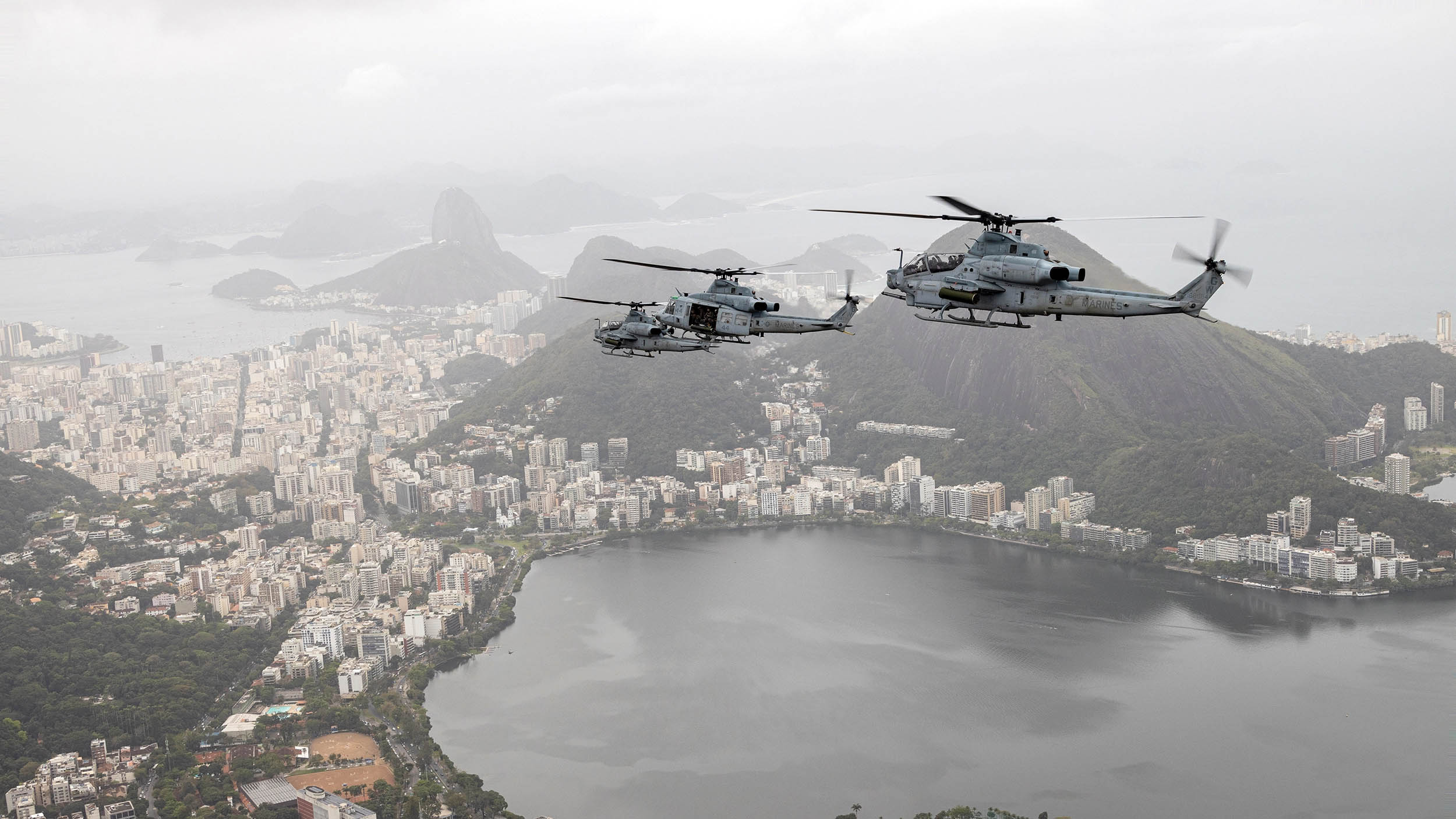 Marines with Marine Light Attack Helicopter Squadron (HMLA) 773, 4th Marine Aircraft Wing, Marine Forces Reserve, in support of Special Purpose Marine Air-Ground Task Force Unitas LXIII, conduct flight operations near Christ the Redeemer statue at Corcovado Mountain, Rio de Janeiro, during exercise Unitas LXIII, September 12, 2022 (U.S. Marine Corps/Jonathan L. Gonzalez)