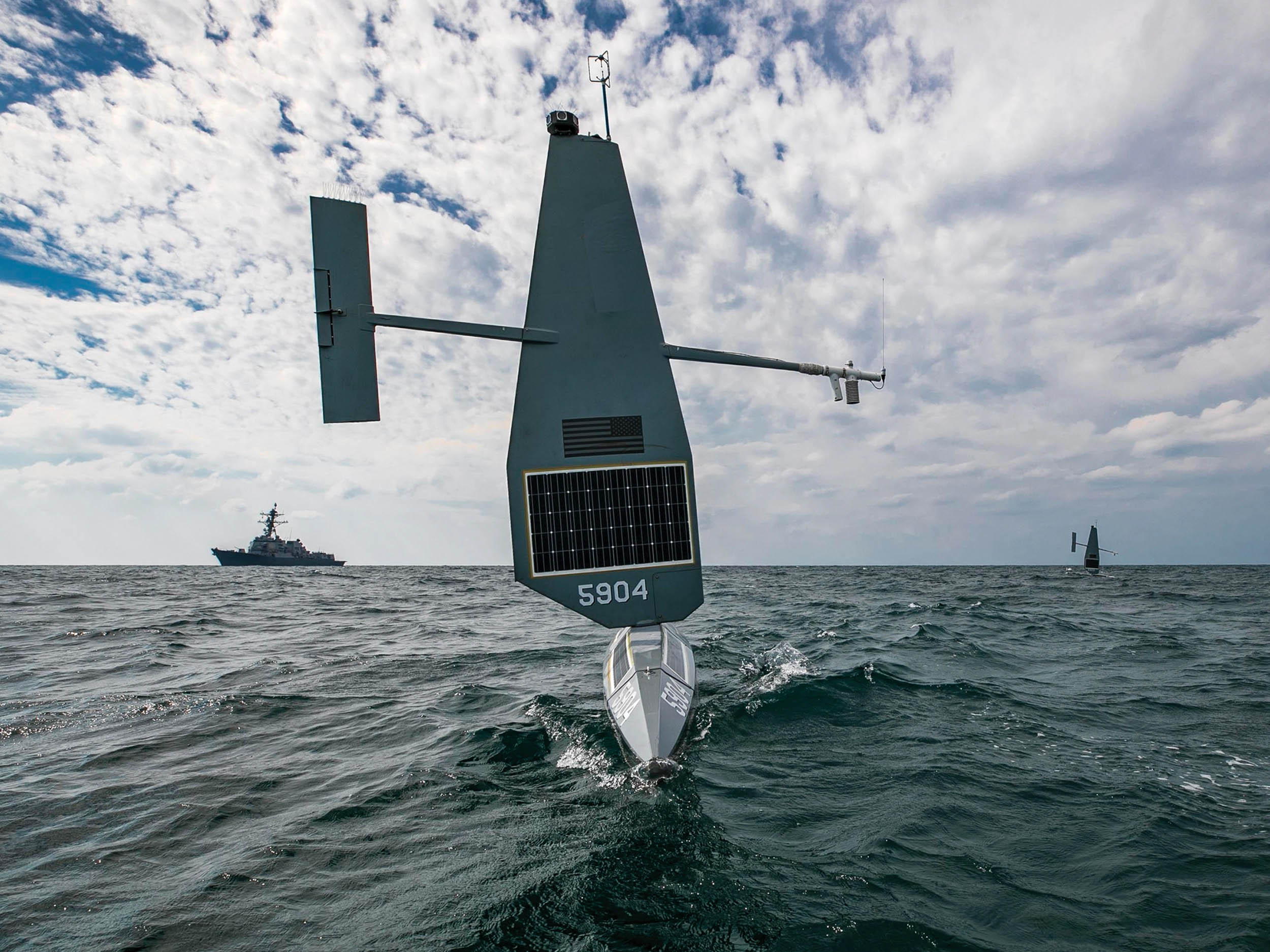 Saildrone Explorer unmanned surface vessel and guided-missile destroyer USS Delbert D. Black operate in Arabian Gulf, January 8, 2023 (U.S. Navy/Jeremy Boan)