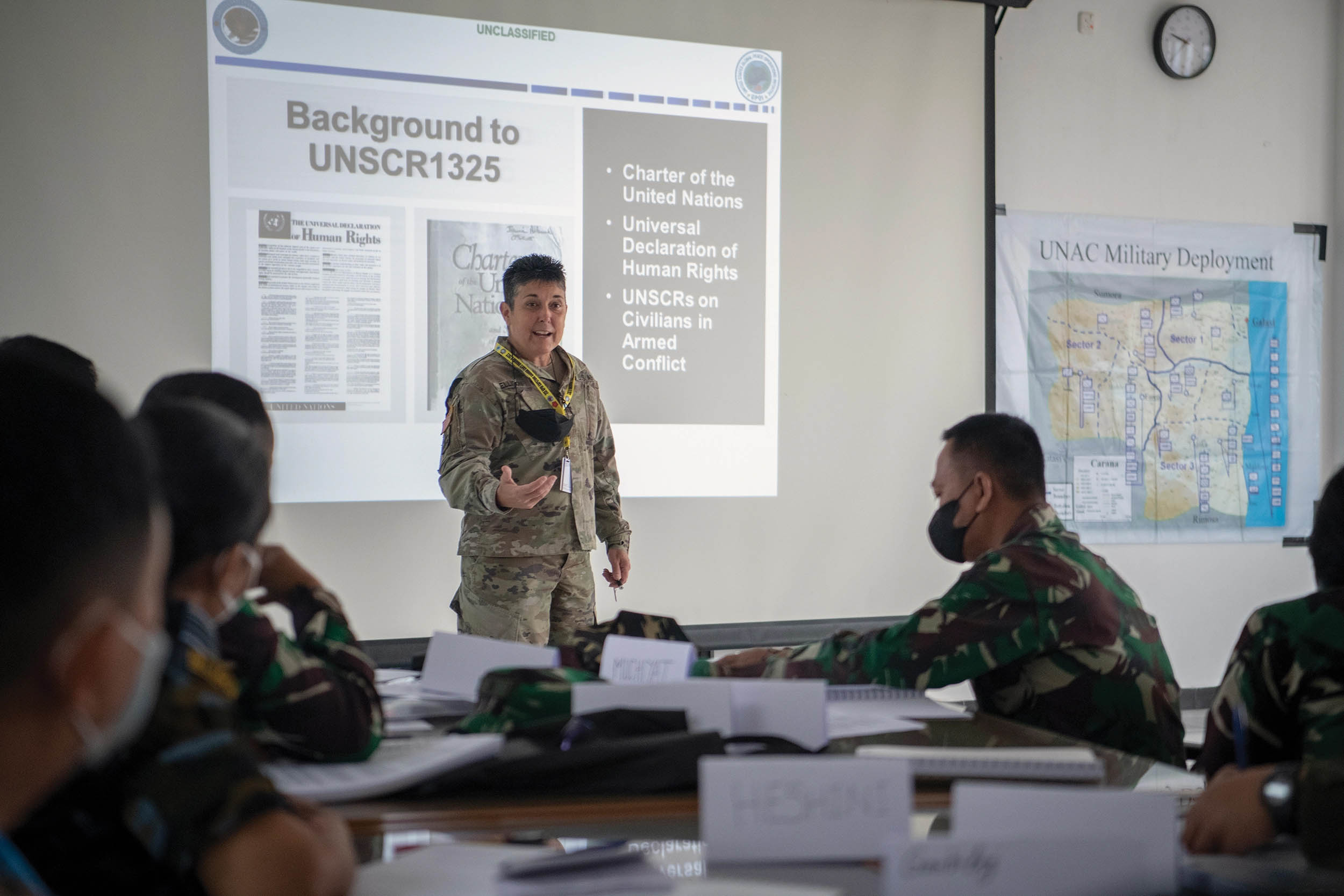 Colonel Pam Ellison with Hawaii Army National Guard speaks to students on Women, Peace, and Security initiatives and integration into peacekeeping operations, in Pusat Misi Pemeliharaan, Indonesia, July 19, 2022 (U.S. Marine Corps/John Hall)