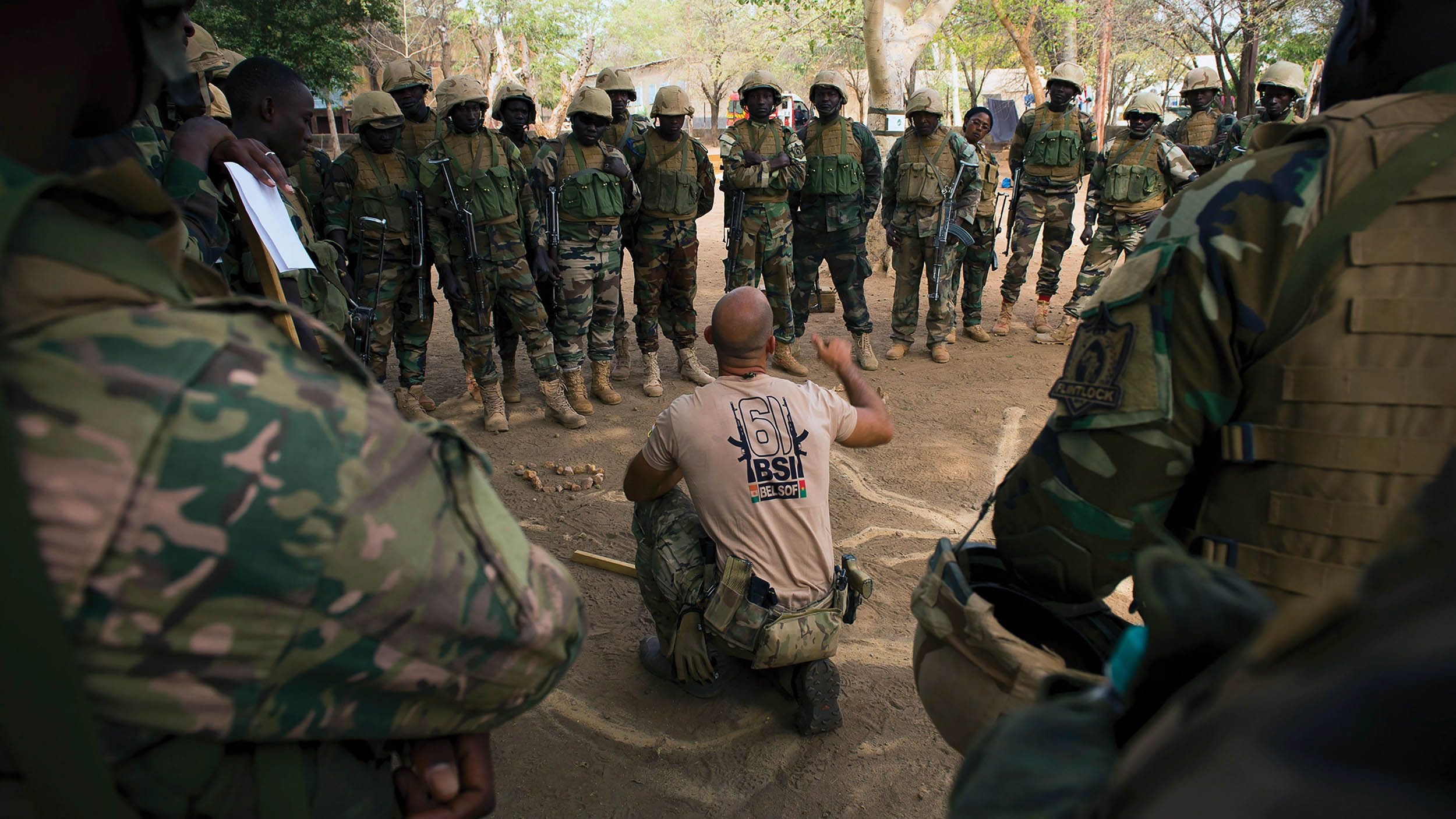 Belgian special forces advise Nigerien soldiers during class on ground movement and attacking an objective, at Camp Po, Burkina Faso, on February 20, 2019, during Flintlock 19 (U.S. Army/Richard Bumgardner)