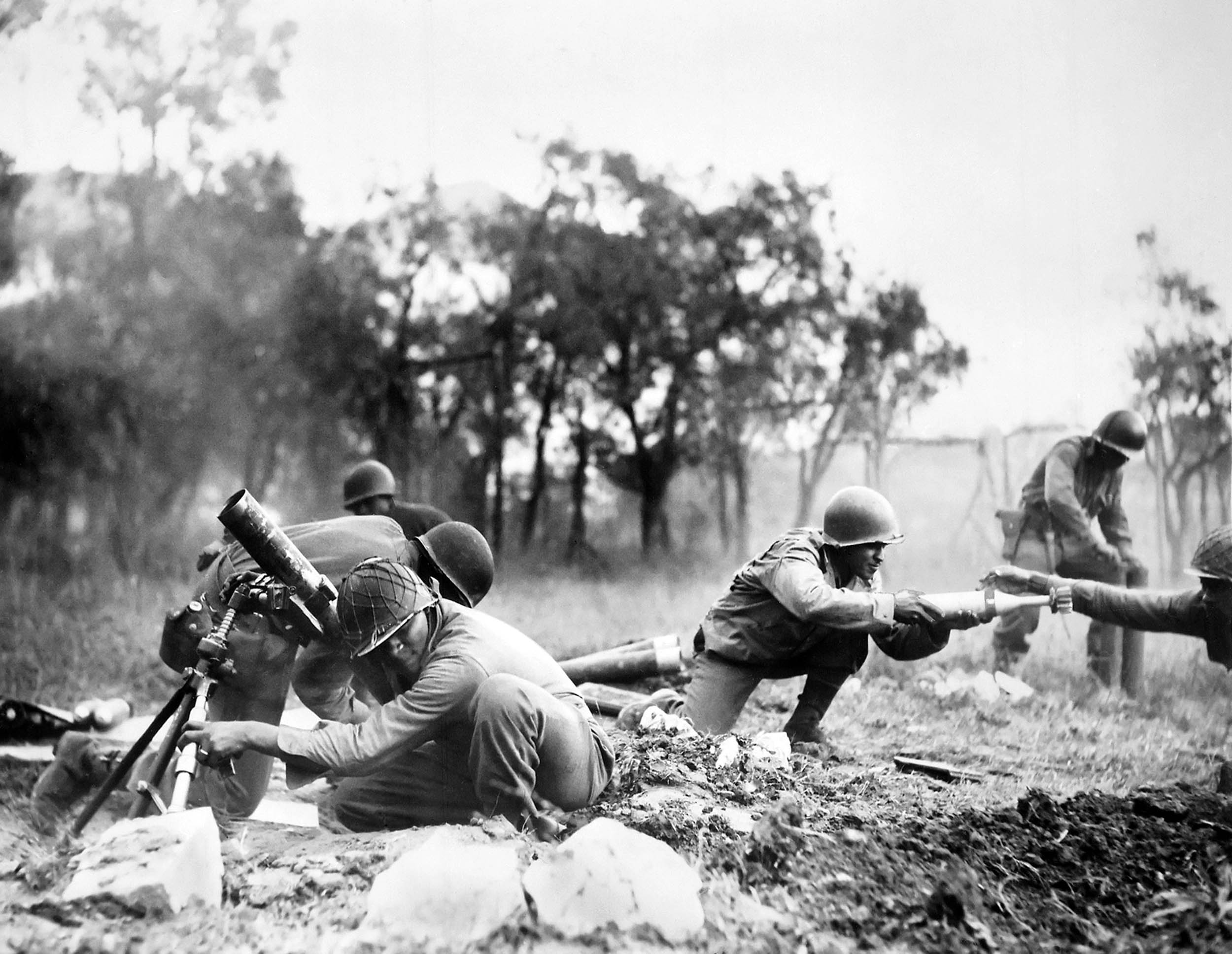Soldiers of 92nd Infantry Division operate mortar near Massa, Italy, November 1944 (U.S. Army/National Archives and Records Administration)