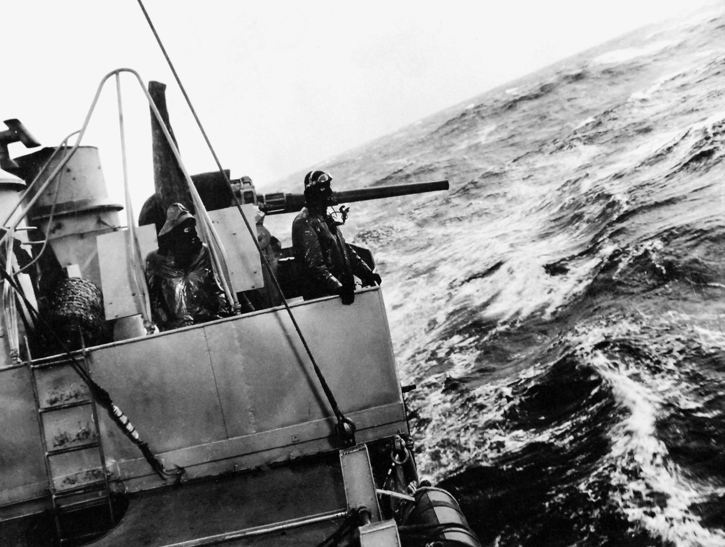Lookouts stand watch on Navy destroyer’s deck house during convoy duty in Atlantic Ocean, June 1943 (U.S. Navy/National Archives and
Records Administration)