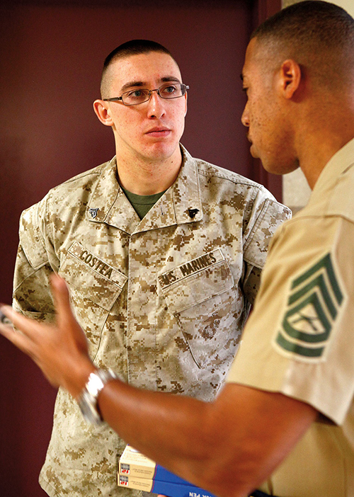 Rifleman listens as Marine career planner explains available career choices (U.S. Marine Corps/Nana Dannsa-Appiah)