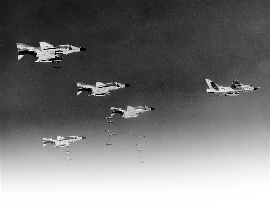 Led by RB-66 Destroyer, pilots flying Air Force F-4C Phantoms drop bombs on communist military target in North Vietnam, August 1966 (U.S. Air Force)