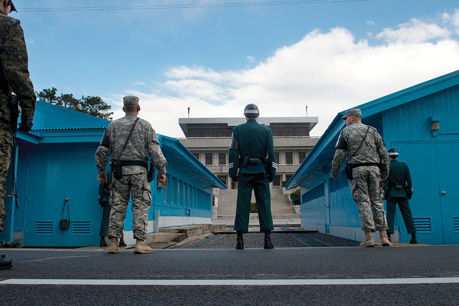 Republic of Korea and U.S. Soldiers at Demilitarized Zone in South Korea face North Korea (DOD/D. Myles Cullen)