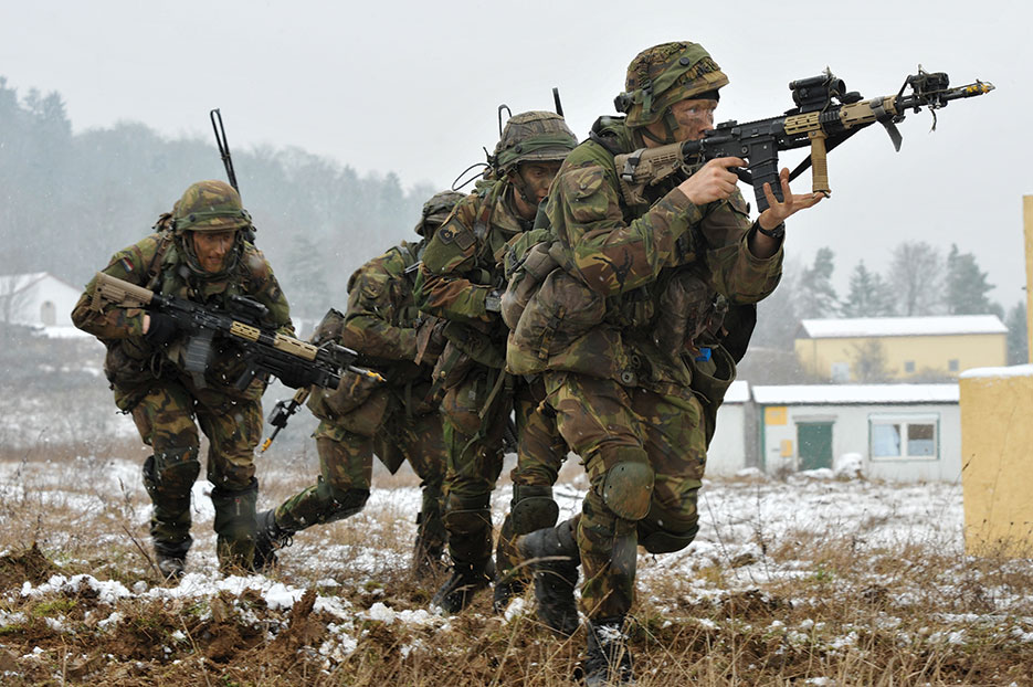 Soldiers provide cover for bounding troops during exercise Combined Resolve III, October 2014, in Grafenwoehr, Germany (U.S. Army/Marcus Floyd)