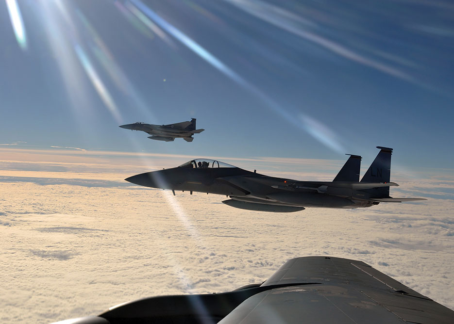 Two F-15C Eagles return to simulated air combat portion of Arctic Challenge exercise over Norway, helping boost interoperability among NATO, the United States, United Kingdom, and members of Nordic Defense Cooperation (U.S. Air Force/Christopher Mesnard)