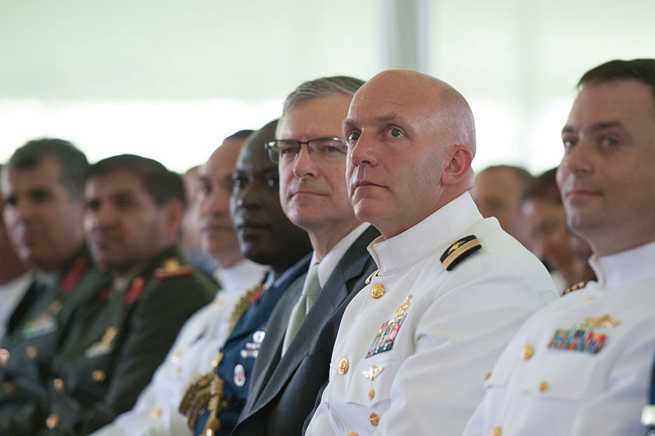 Graduates listen as General Dempsey delivers commencement address at National Defense University graduation ceremony in Washington, DC, June 18, 2015 (DOD/Daniel Hinton)