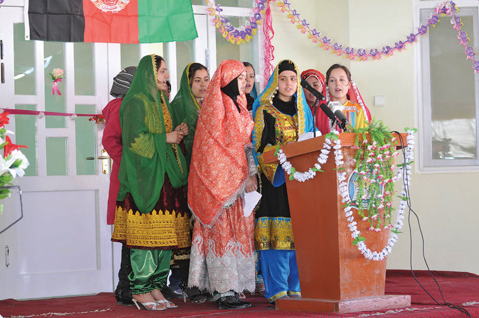 Students of Sar Asyab Girls High School in Kabul sing national anthem of Afghanistan at ribbon-cutting ceremony commemorating completion of new school funded by U.S. Forces–Afghanistan Commander’s Emergency Response Program (U.S. Air Force/Jordan Jones)