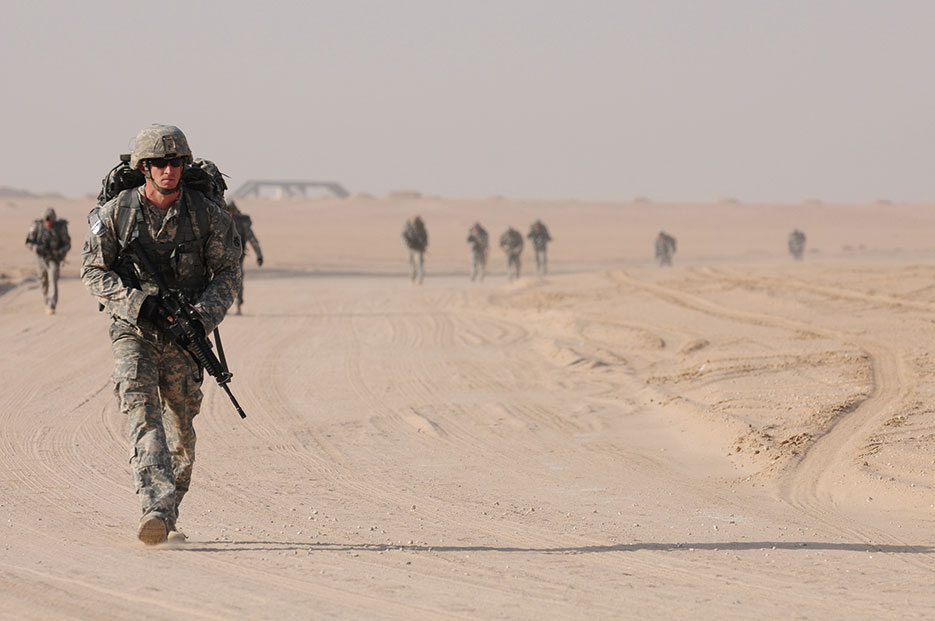 Soldiers from Minnesota National Guard complete ruck march at Forward Operating Base Gerber, Kuwait, January 27, 2012 (U.S. Army/Trisha Betz)