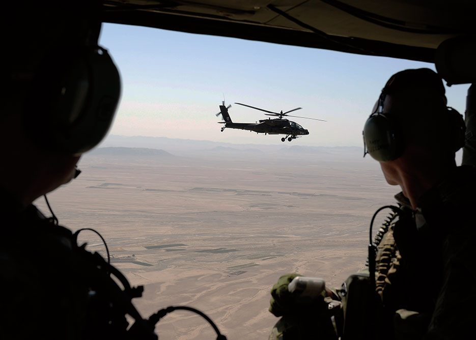 ANA 205th Corps Commander Brigadier General Dawood Shah Wafadar and Train, Advise, and Assist Command–South Commander U.S. Army Brigadier General Paul Bontrager conduct aerial battlefield familiarization flight in southern Afghanistan, August 4, 2015 (DOD/Kristine Volk)