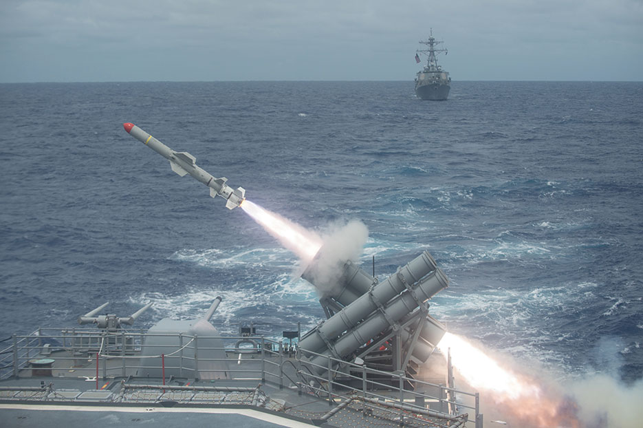 Harpoon missile launches from guided-missile cruiser USS Shiloh (CG 67) during Exercise Valiant Shield 2014, focusing on real-world proficiency in sustaining joint forces at sea, in air, on land, and in cyberspace (DOD/Kevin V. Cunningham)