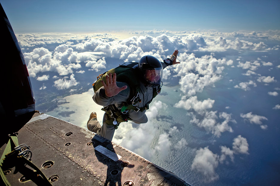 Marine assigned to Detachment 4<sup>th</sup> Force Reconnaissance Company jumps from UH-1Y Venom helicopter during airborne insertion training at Marine Corps Air Station Kaneohe Bay, Hawaii, June 2015 (U.S. Marine Corps/Aaron S. Patterson)