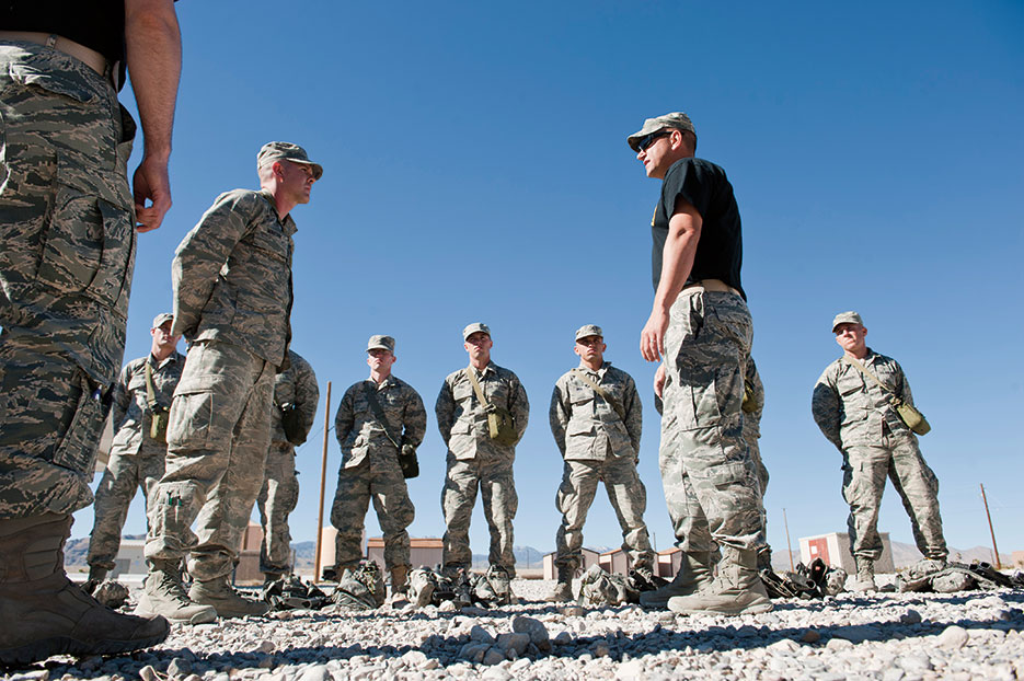Ranger Assessment Course instructor (right), informs class leader that he needs to improve leadership skills, Nevada Test and Training Range, October 3, 2014 (U.S. Air Force/Thomas Spangler)