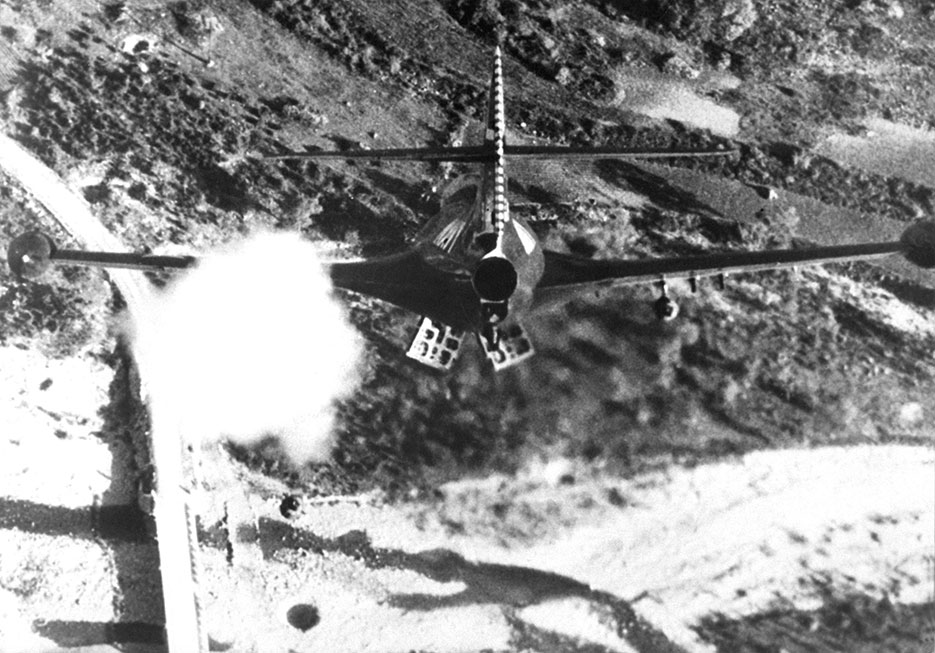 Pilot from USS Bon Homme Richard bombs Korean bridge, November 1952 (U.S. Navy/NARA)