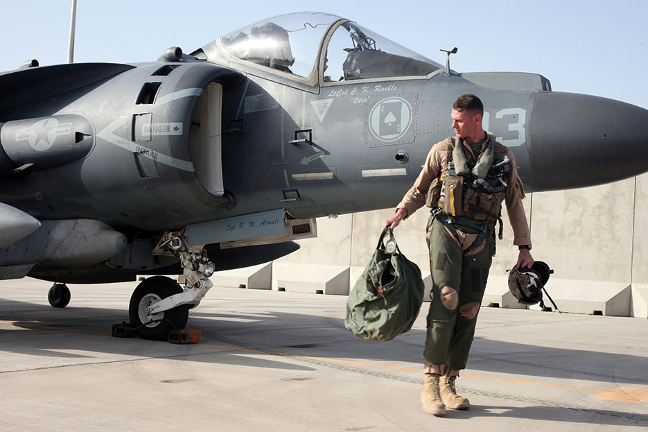 AV-8B Harrier aircraft pilot with Marine Attack Squadron 211, Marine Aircraft Group 13, 3rd Marine Aircraft Wing (Forward), relocates Harrier to Camp Bastion, Helmand Province, to increase overall readiness level after September 14, 2012 attack (DOD/Keonaona Paulo)