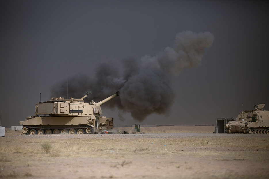 Army M109A6 Paladin conducts fire mission at Qayyarah West, Iraq, in support of Iraqi security forces’ push toward Mosul, October 17, 2016, to defeat so-called Islamic State (U.S. Army/Christopher Brecht)